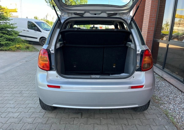 Suzuki SX4 cena 26900 przebieg: 153000, rok produkcji 2012 z Borne Sulinowo małe 254